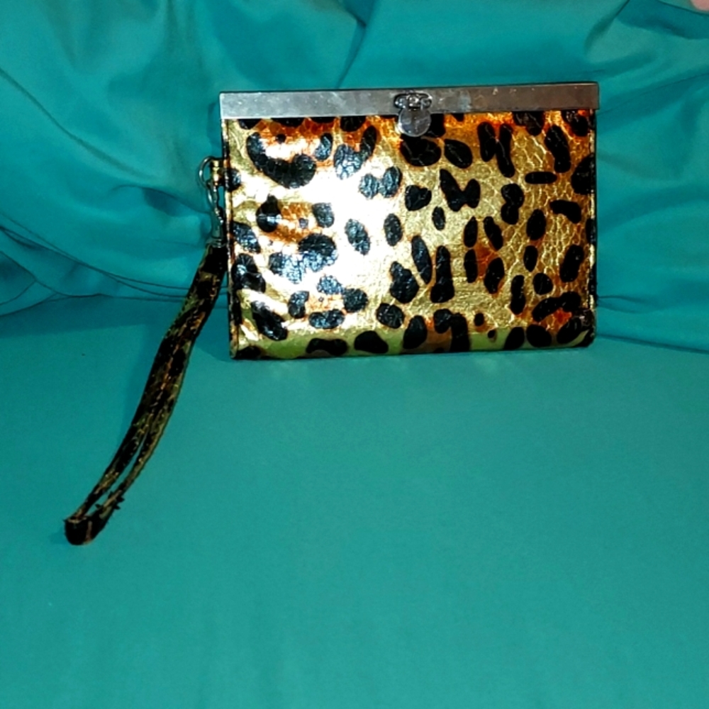 a very cute, leopard wristlet